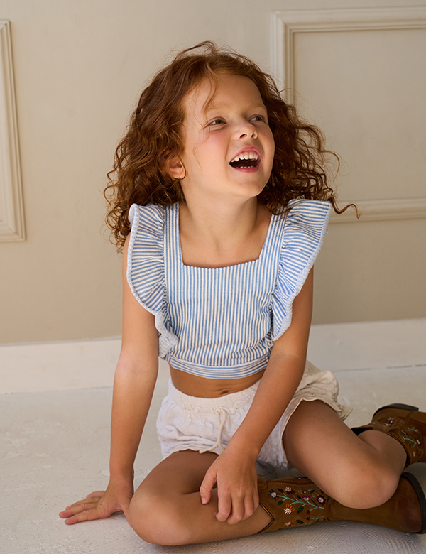 Kinderlijk model met rood haar Loa G.