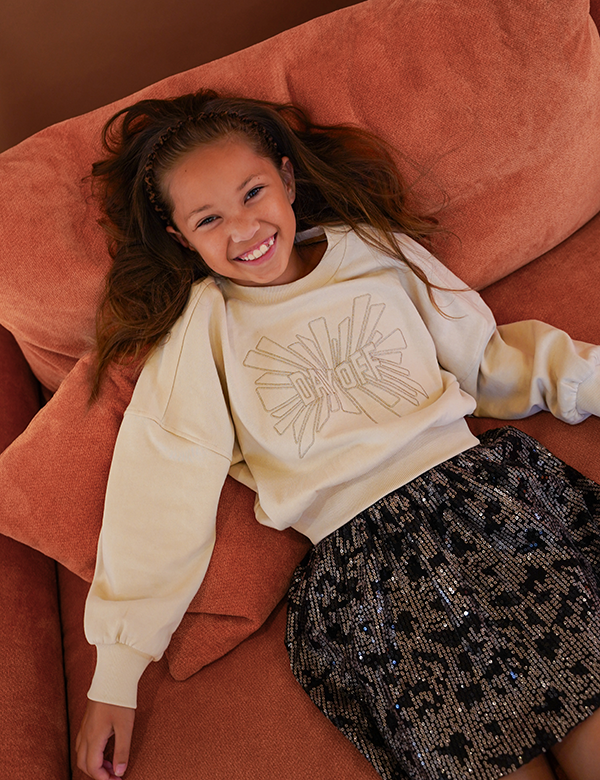 Kinderlijk model met bruin haar Aaliyah O.